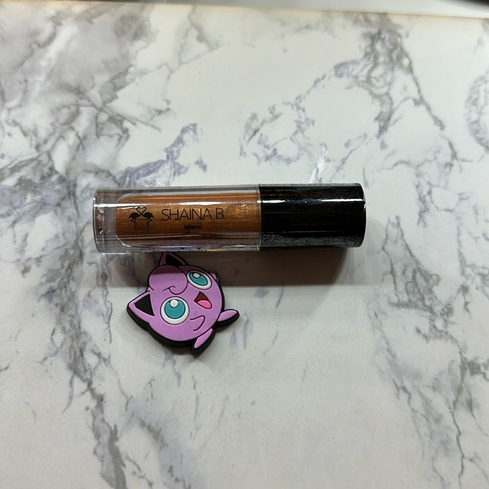 Shaina B Miami Liquid Highlighter in Qué Calor